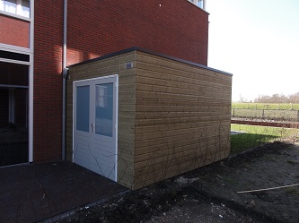 Houten_schuur_in_nieuwbouwproject